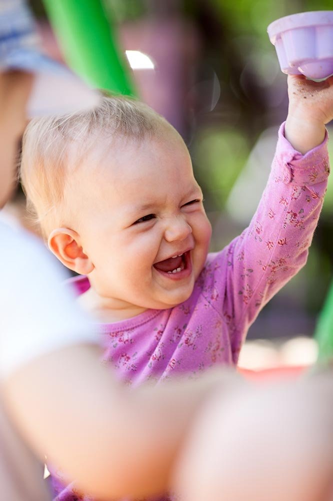 happy-toddler-girl-playing-with-sand-outside-2026-01-05-05-11-54-utc.jpg